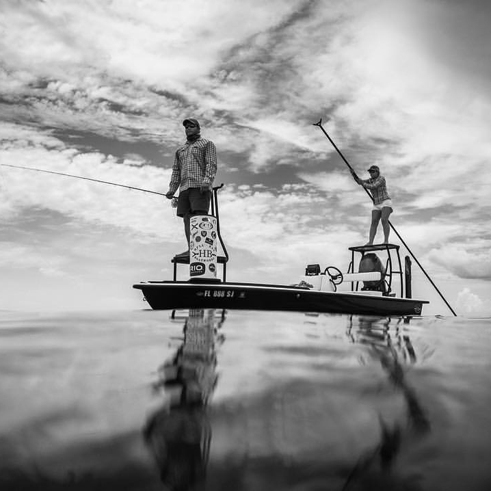 Fly fishing from a skiff on glassy flats