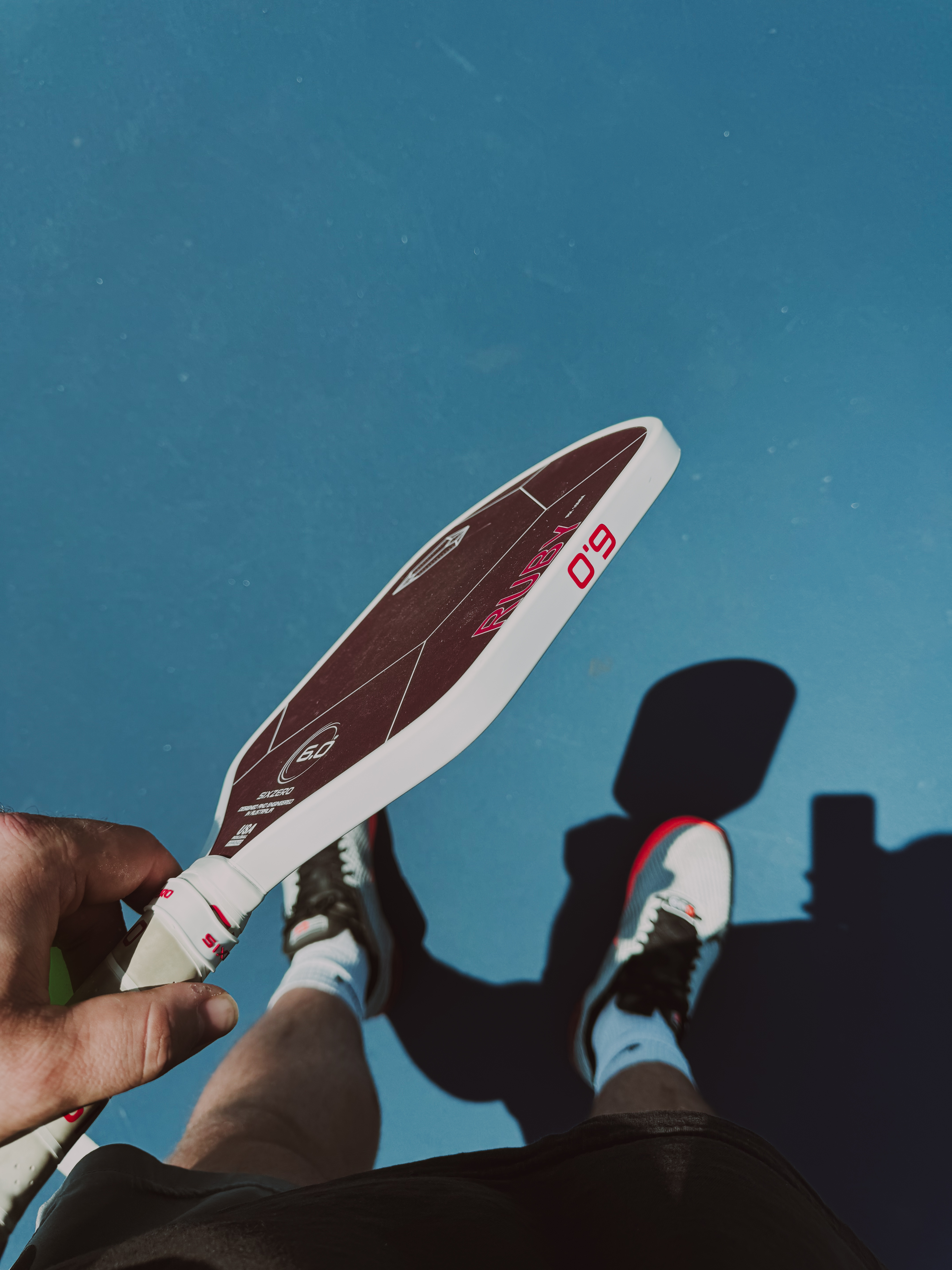 Pickleball paddle on the court
